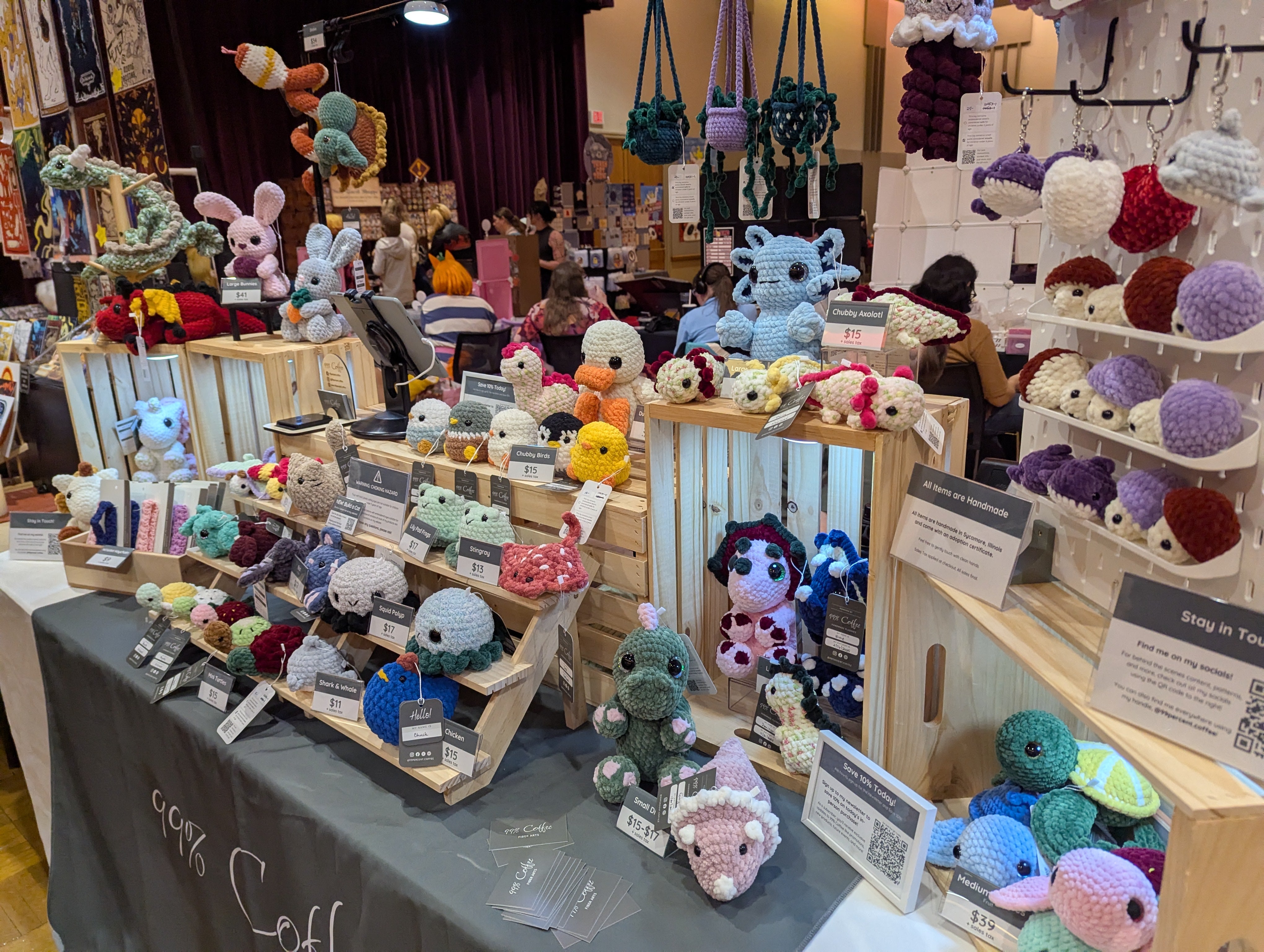 The 99 Percent Coffee booth at Karoshi Con 2025 in Dekalb Illinois